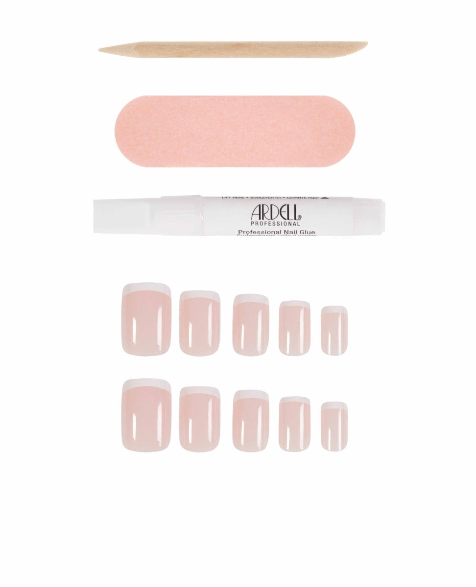A set of classic pink French tip square press-on nails with nail glue and accessories for a timeless manicure.