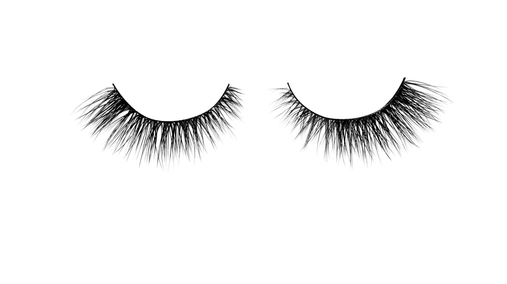 A pair of Ardell Magnetic Megahold 056 showing its winged flared lashes isolated in white color setting