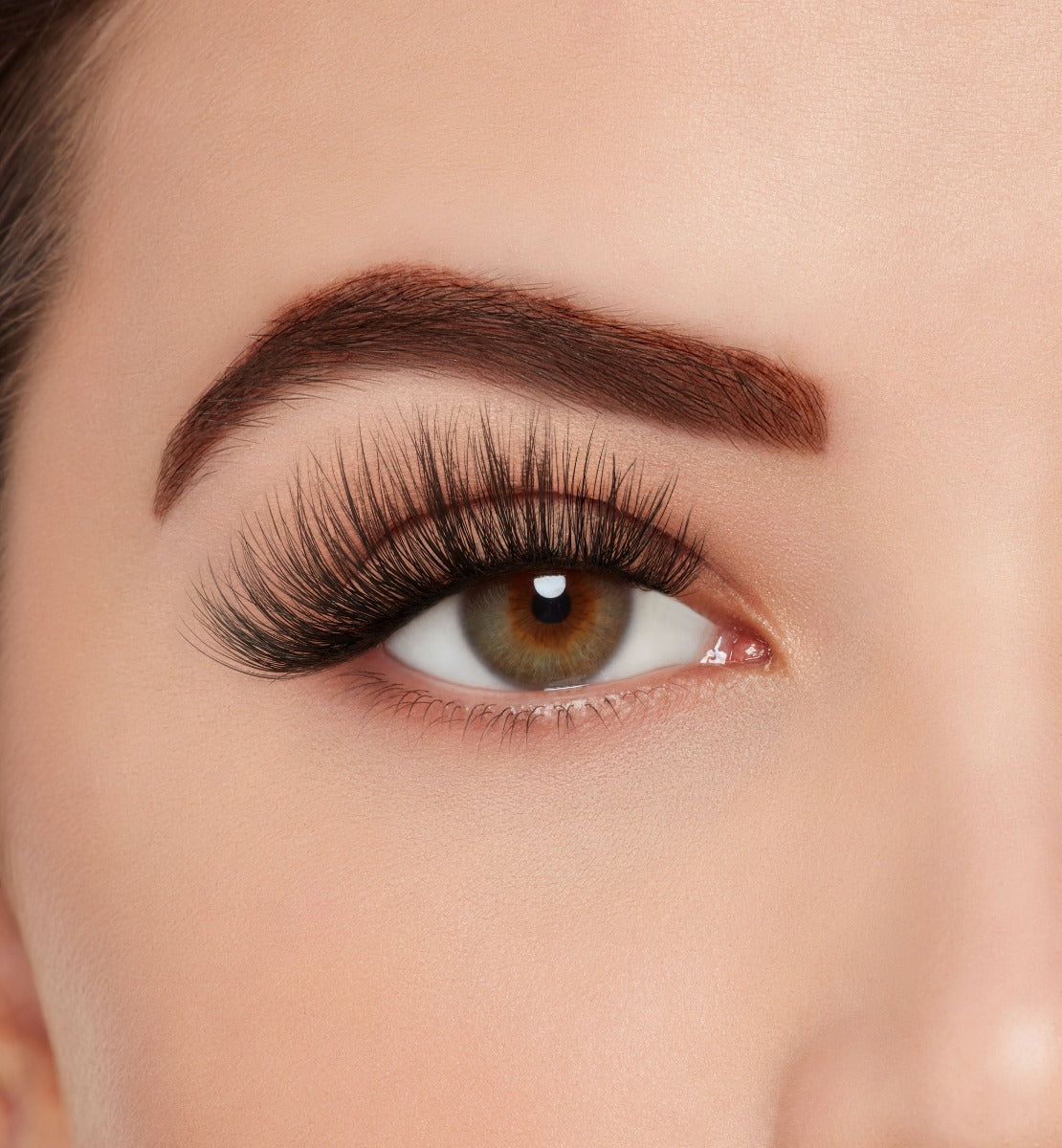 Close-up of a model's open right eye wearing Ardell Mega Volume 260 false eye lashes