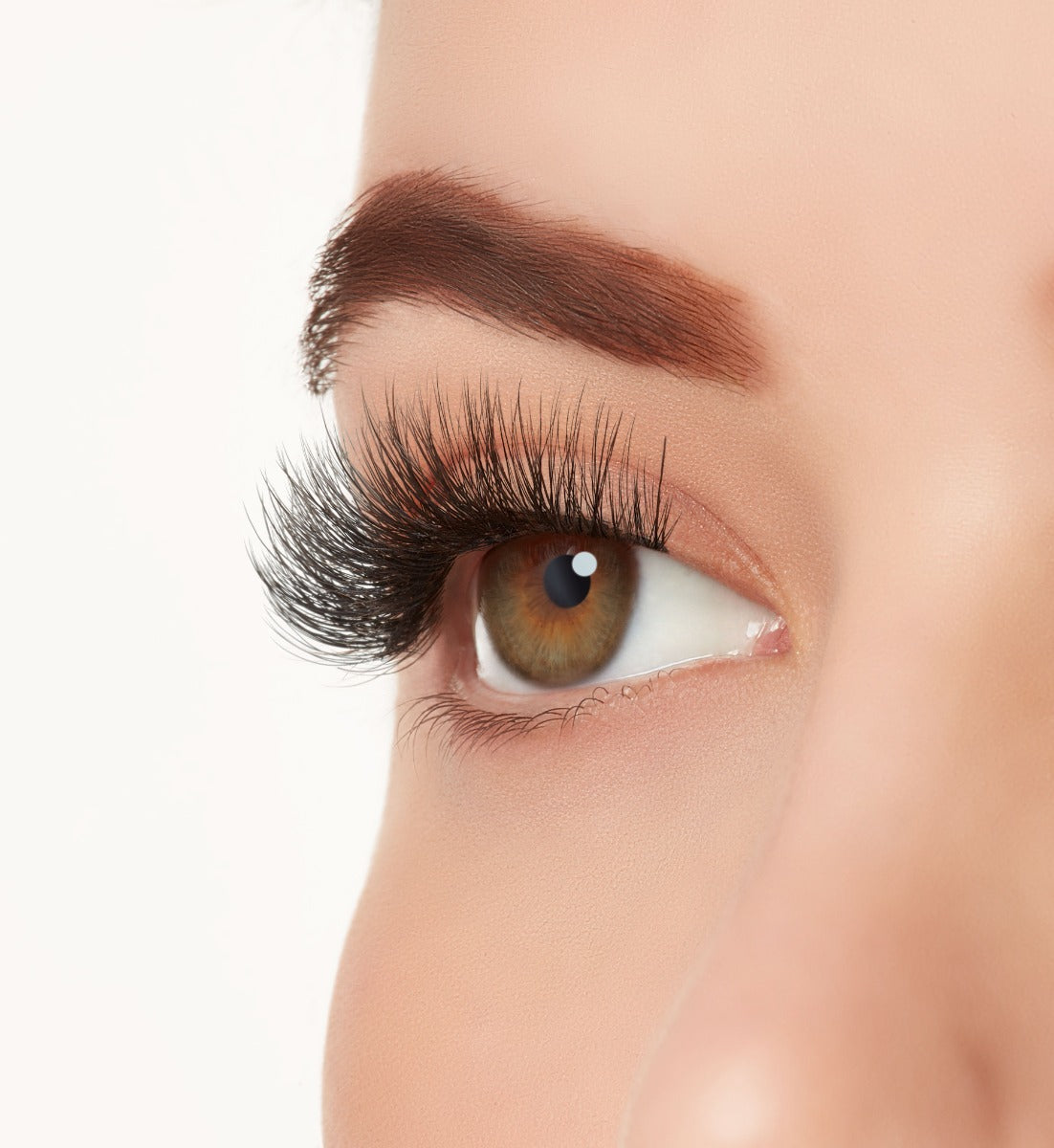 Side view close-up of a model's open right eye wearing Ardell Mega Volume 262 artificial eye lashes