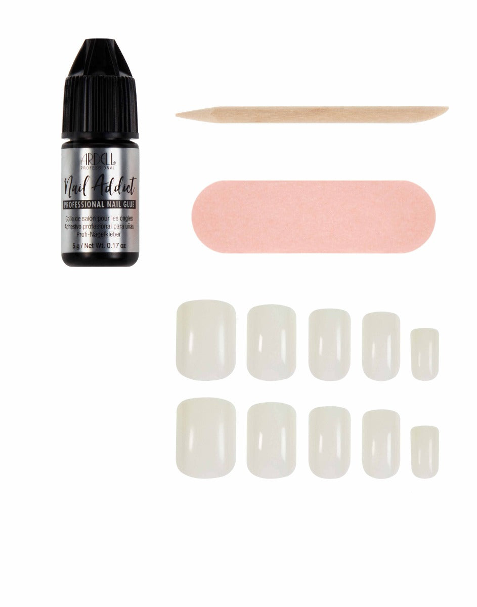 A set of clear short square press-on nails with Ardell Nail Addict glue, buffer, and applicator for a natural look.
