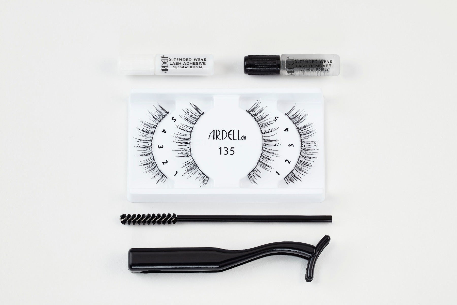 Ardell 135 lash kit with adhesive, remover, spoolie, and applicator for perfect lashes.