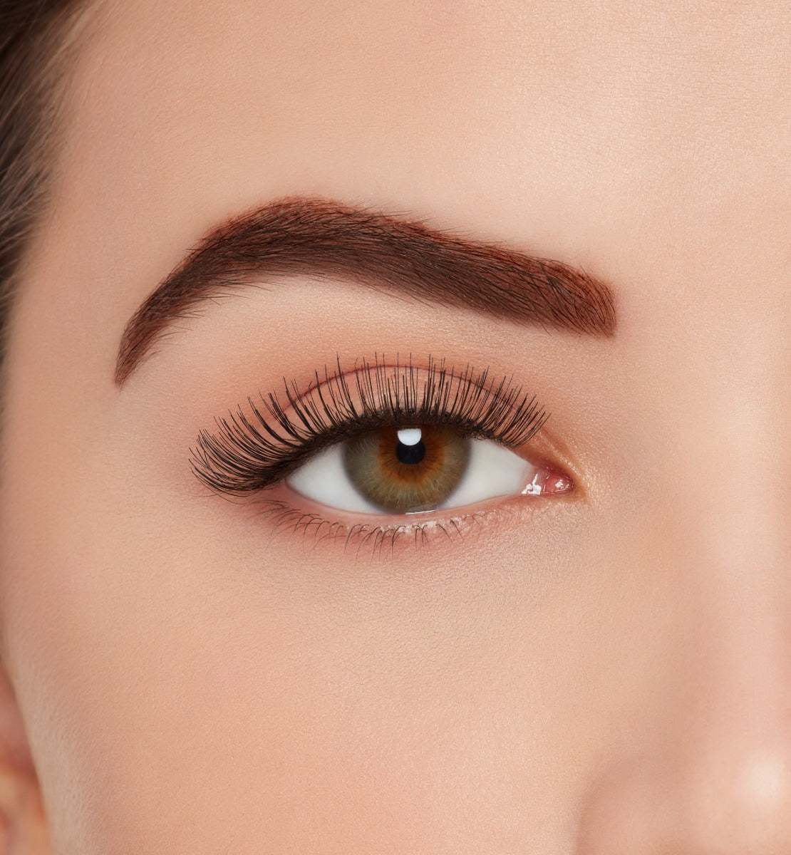 Front view of a model with wearing Ardell, X-tended Wear #105  lashes to show how they look on the eye
