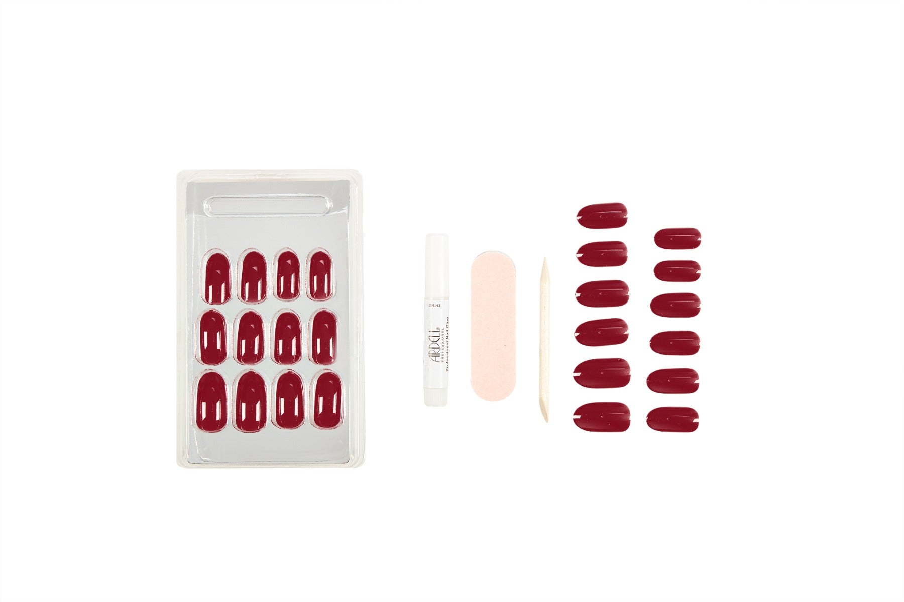 A set of glossy deep red Sip of Wine colored press-on nails with nail glue, file, and applicator for a salon-perfect manicure at home.