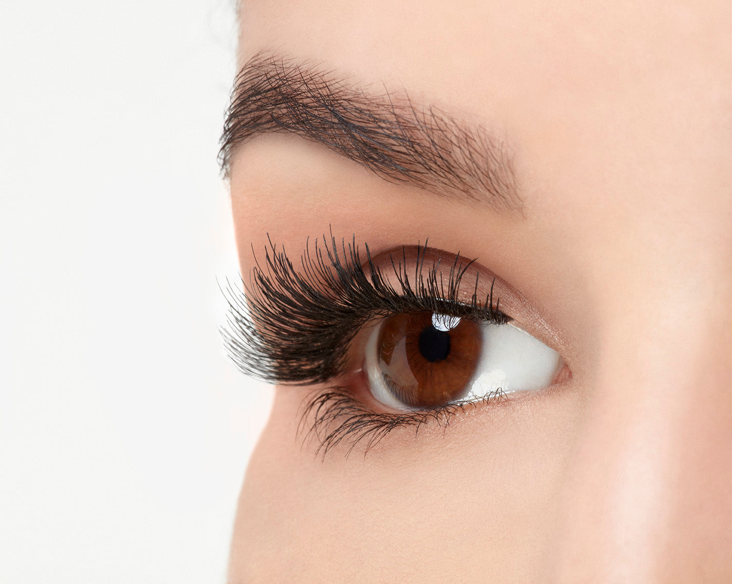 A model wearing Ardell Studio Effects 230 showing its natural-looking lash and the undetectable lash band