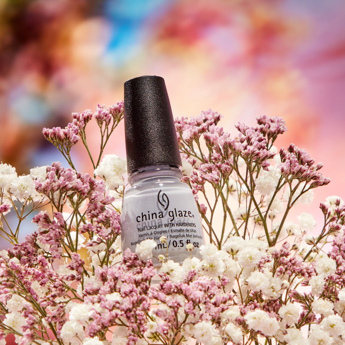 Stylized image of China Glaze Nail Lacquer, Fields of Lilac bottle