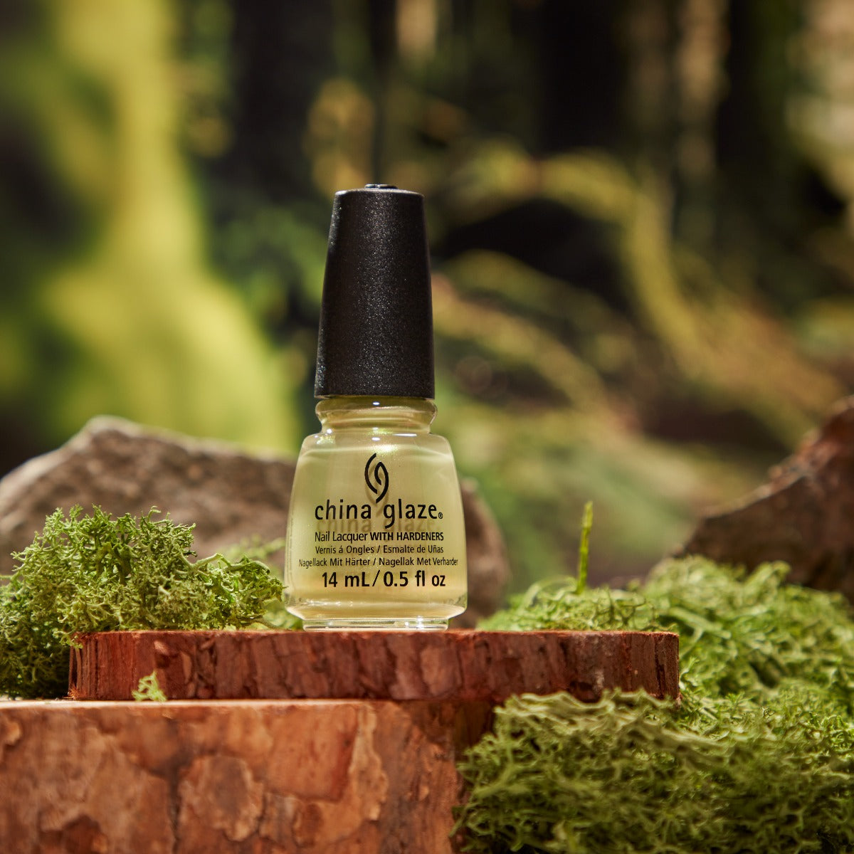 Stylized image with China Glaze Nail Lacquer, Meet Me in The Meadow bottle 