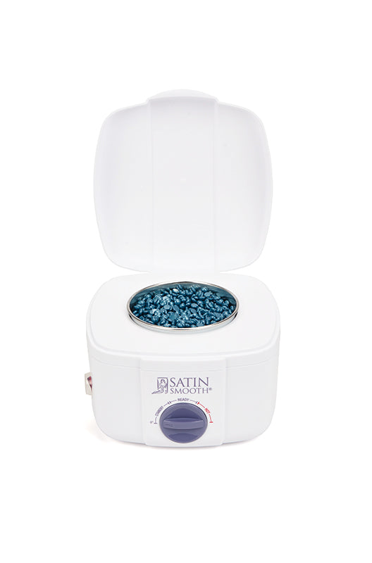 Satin Smooth Professional Single Wax Warmer with fully opened lid displaying its wax well filled with dark blue wax granules