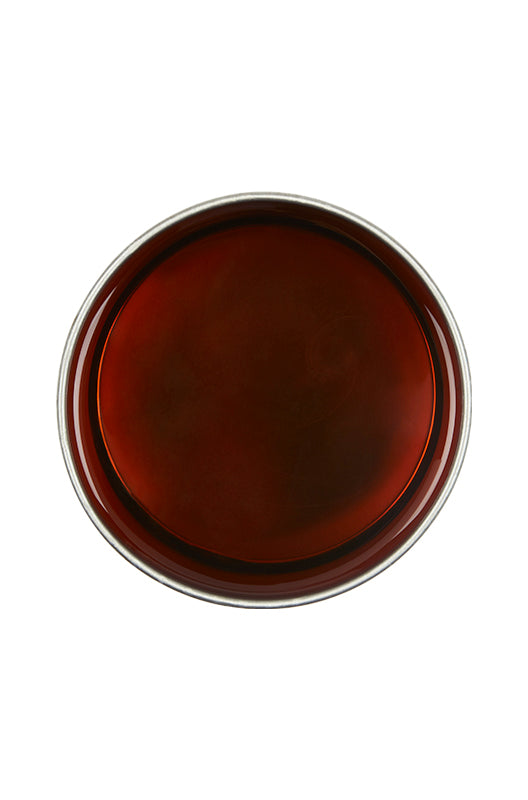 Top view image of liquid sugar for removing hair isolated in white background