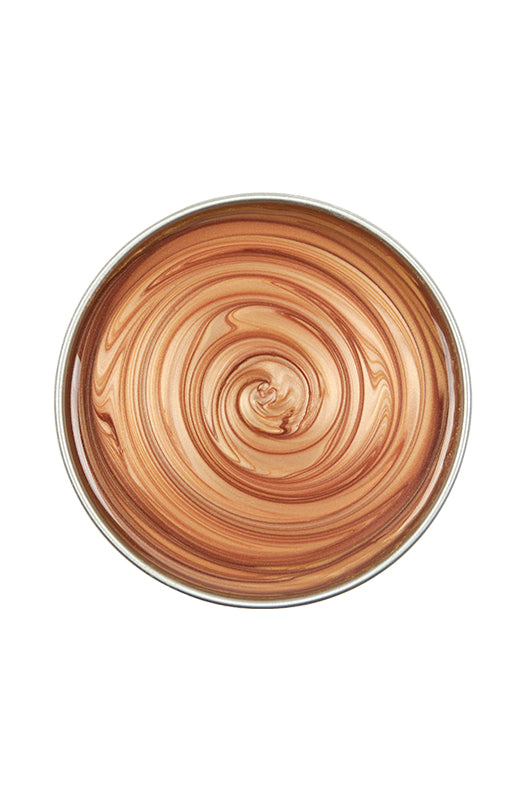 Top view of a can of Satin Smooth Golden Quartz Wax with no lid featuing its glossy honey-like color
