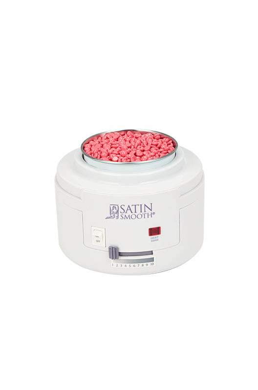 Front view of Satin Smooth Professional Single Wax Warmer with no lid with its wax well filled with red wax granules